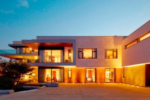 warm lit contemporary home with aluminium windows and bi fold doors