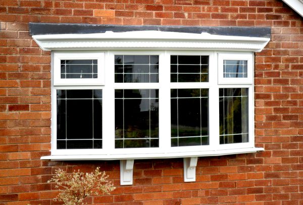 Bow Window Pane with decorative glass in white uPVC
