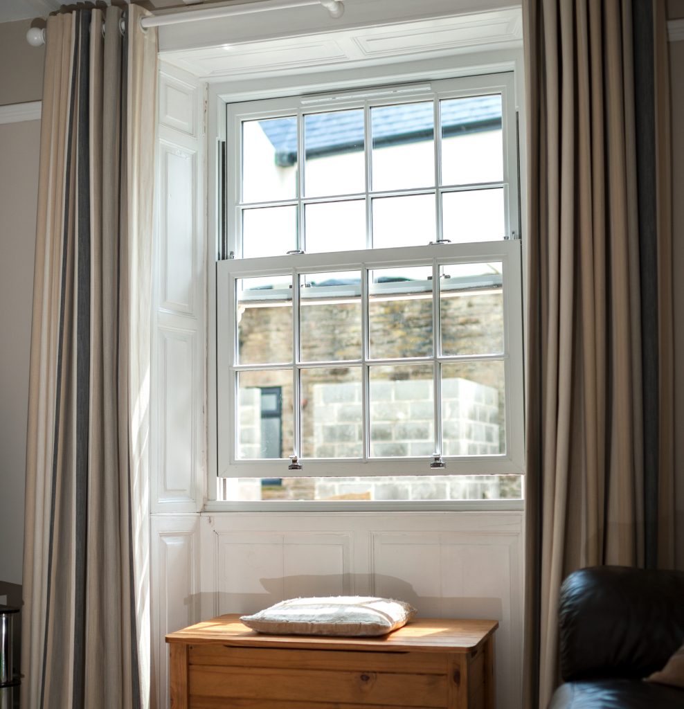 internal image of a sash window slightly open