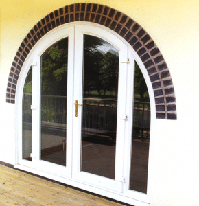 large arched door in white upvc