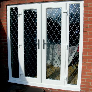 french white upvc doors with lead design