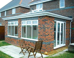 mixed brick orangery with lantern roof upvc windows and patio doors