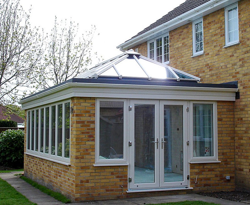 white upvc orangery with lantern roof