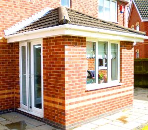 Small solid tiled roof Orangery