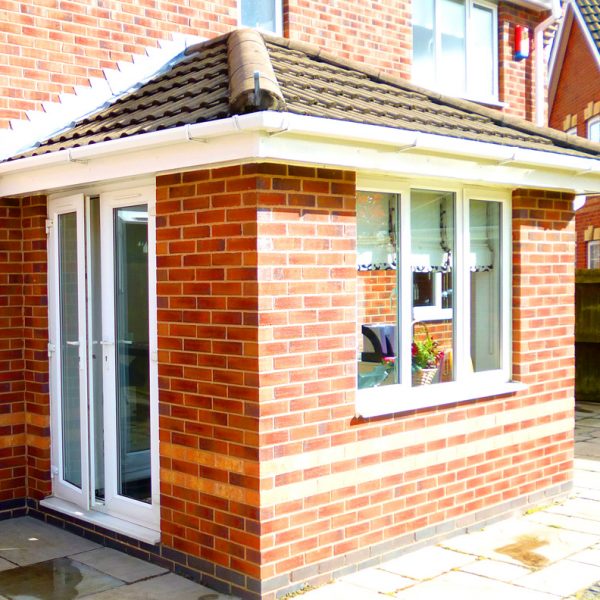 Small solid tiled roof Orangery