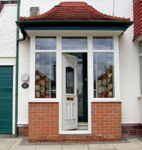 Square white porch with upvc door