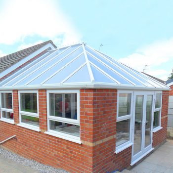 red brick orangery with glass roof