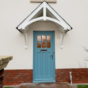 Pitched door canopies with solid tile roof
