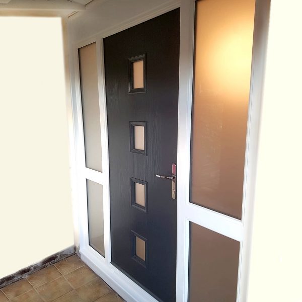 Black door with espirit style and four panes of glass