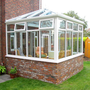 glass extension with half brick base and white upvc double glazing